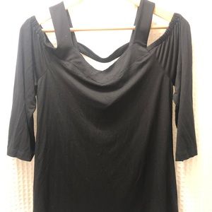 Black peek a boo shoulder shirt.